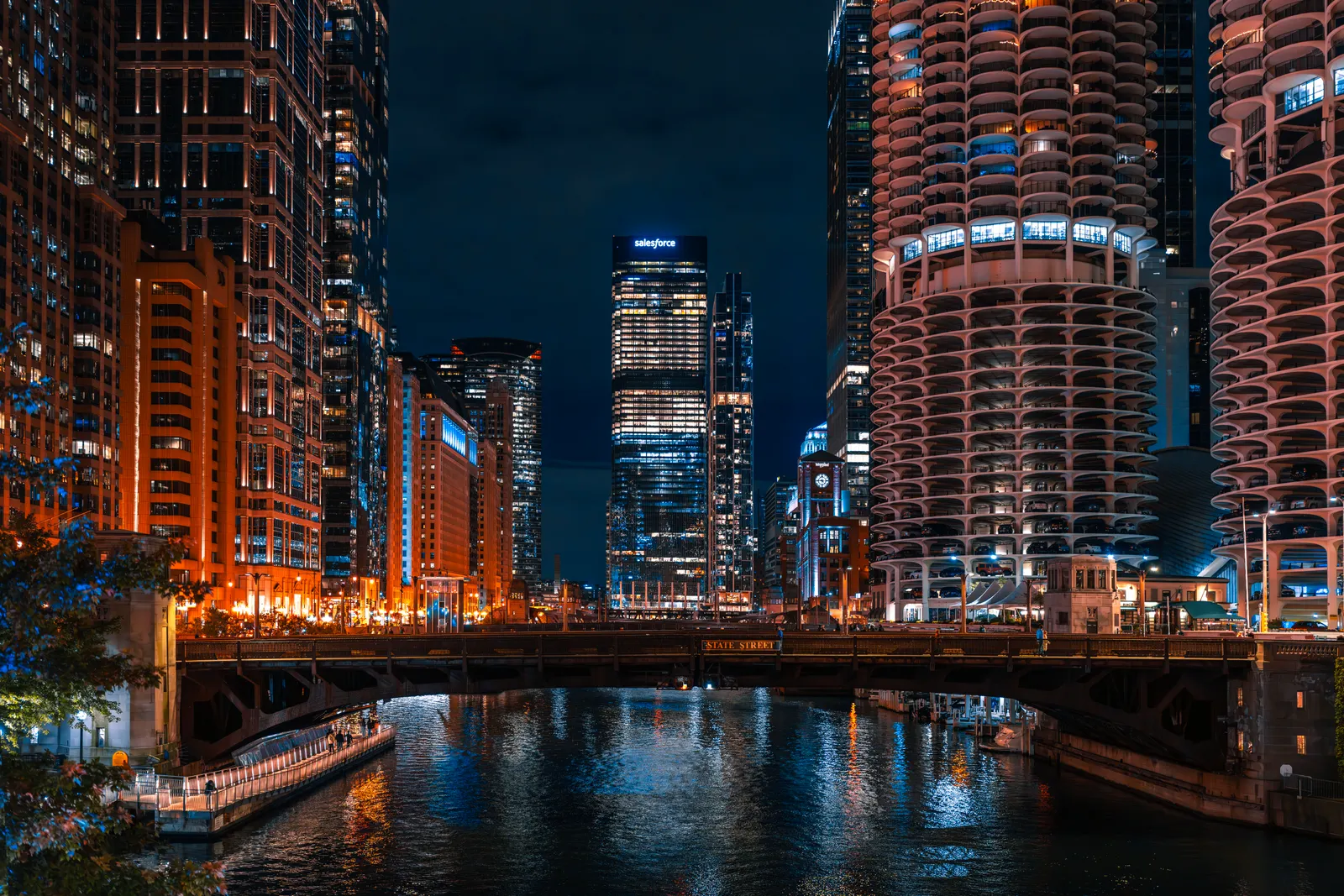 Chicago River and skyline lit up at night