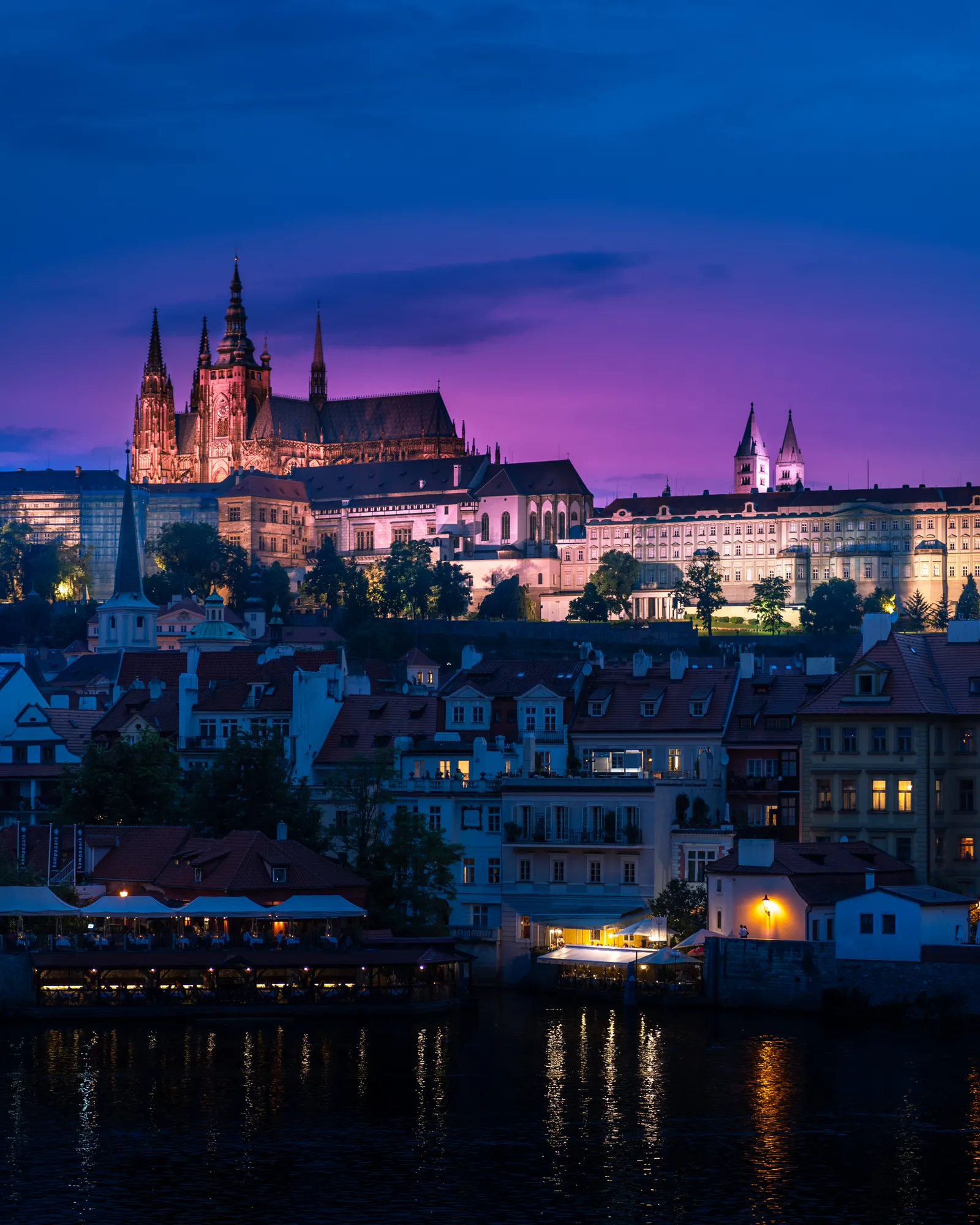 Prague historic streets and towers in evening light