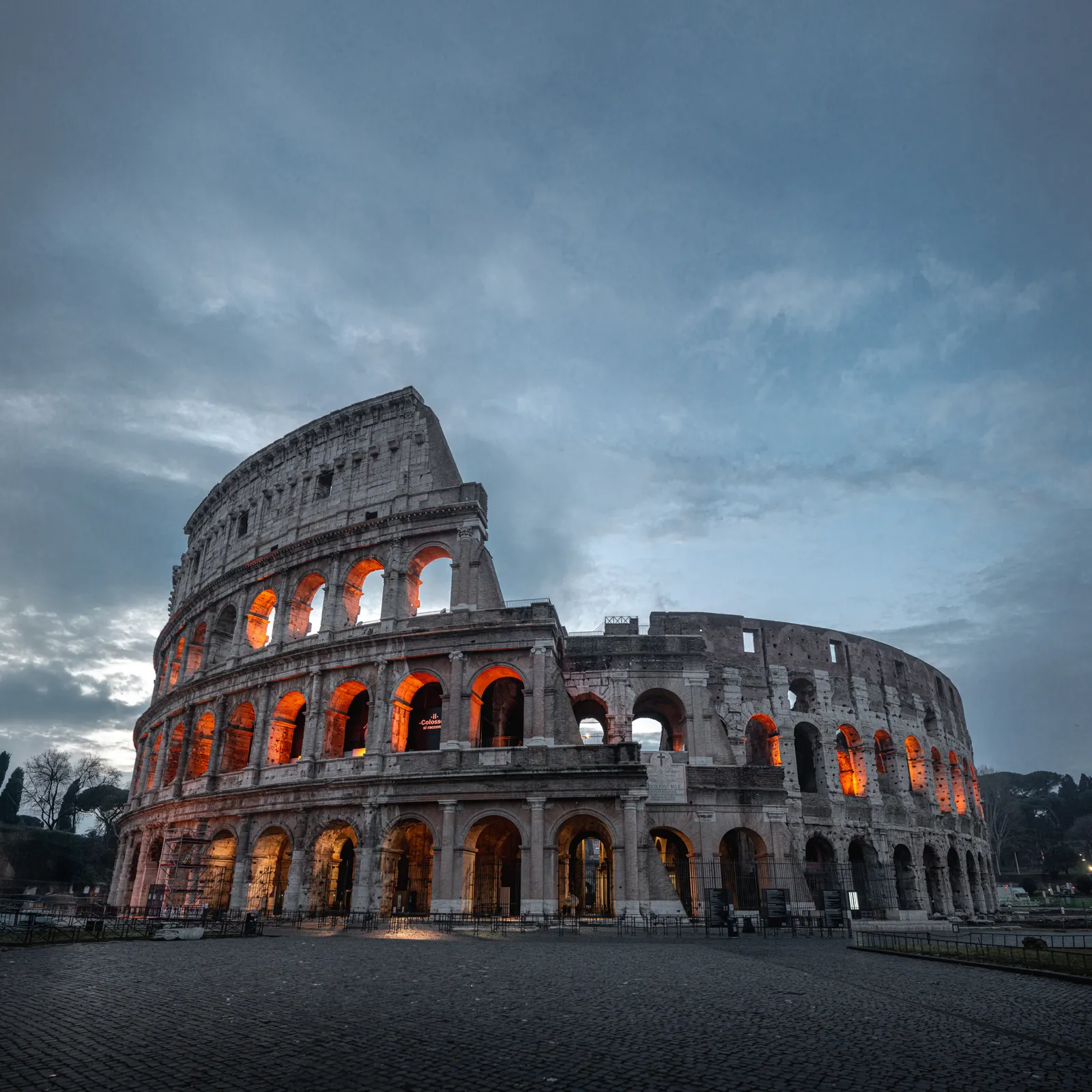 The Colosseum lit at night in Rome